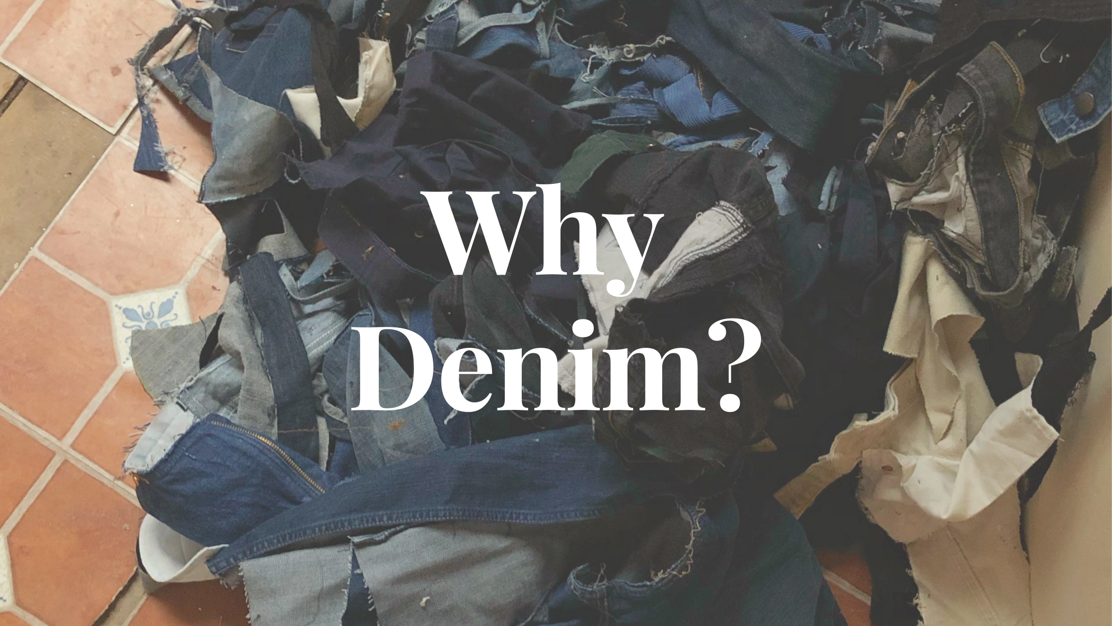 Pile of scrap denim with text, "Why Denim?" overlayed 